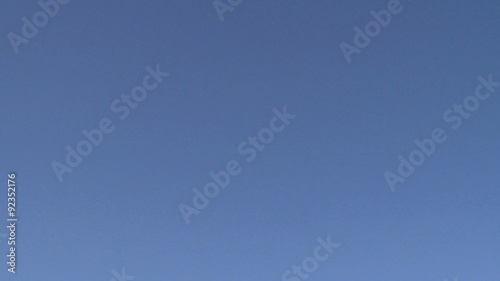 Airplane flies by lens