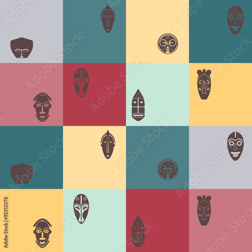Seamless background with African ritual masks for your design