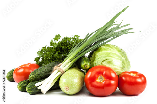 Fresh vegetables on a white background.