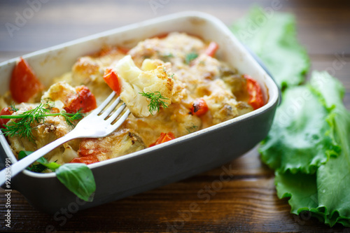 Cauliflower baked with  tomatoes