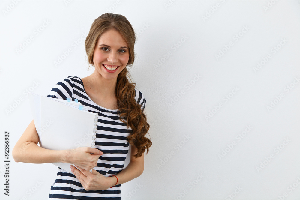 Obraz premium Student Girl near ther wall