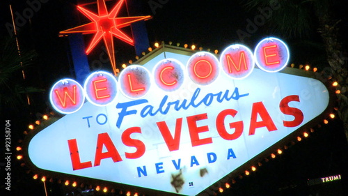 Welcome to Vegas sign at night - fast zoom in