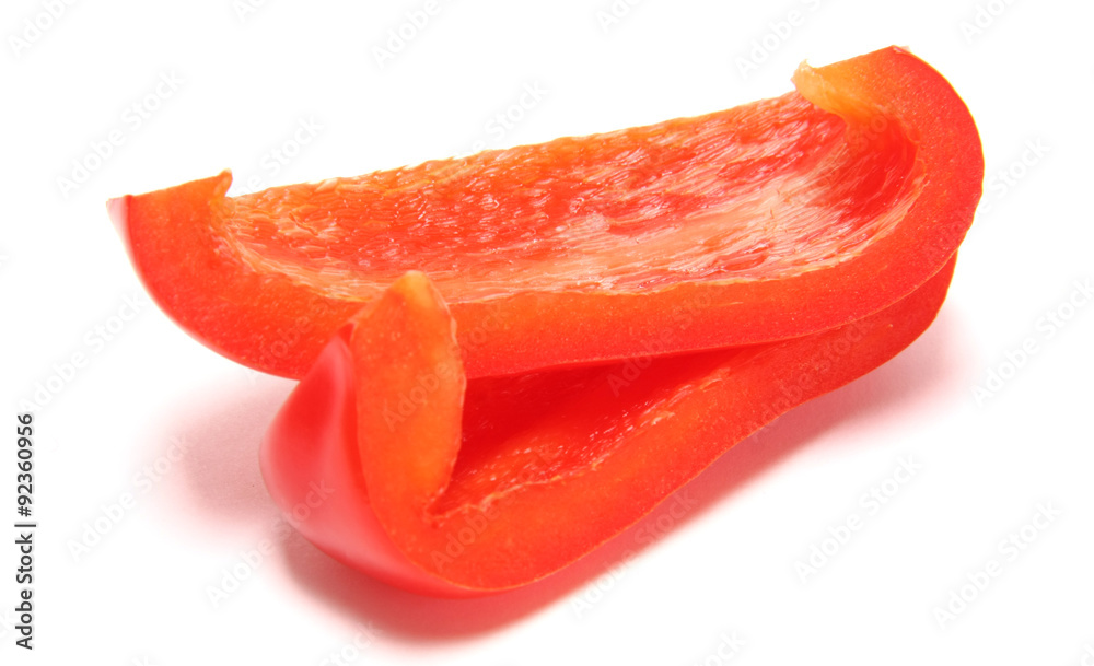 Two slices of pepper on a white background. Two slices of pepper on a white background.