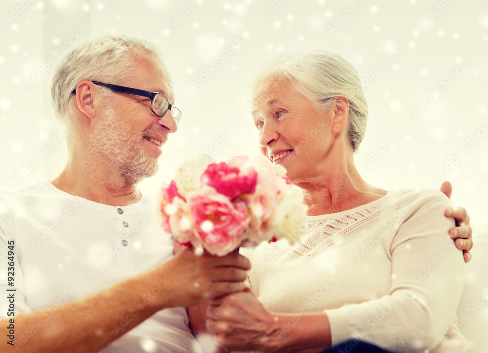 happy senior couple with bunch of flowers at home happy senior couple with bunch of flowers at home