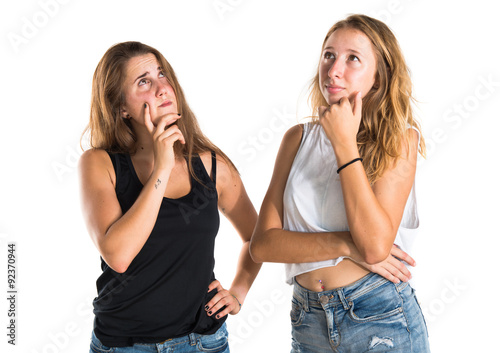 Two girls thinking