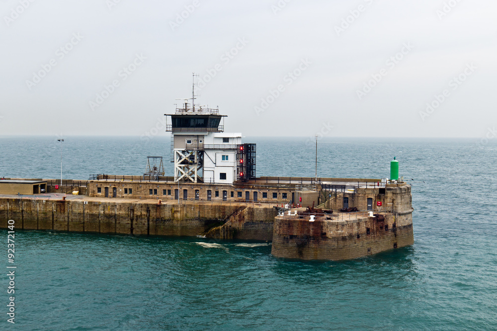 Man-made breakwater structure at port entry Man-made breakwater structure at port entry