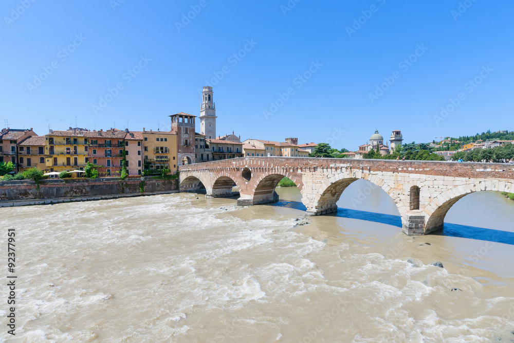 View of the Adige river and St Peter bridge arch, Verona,