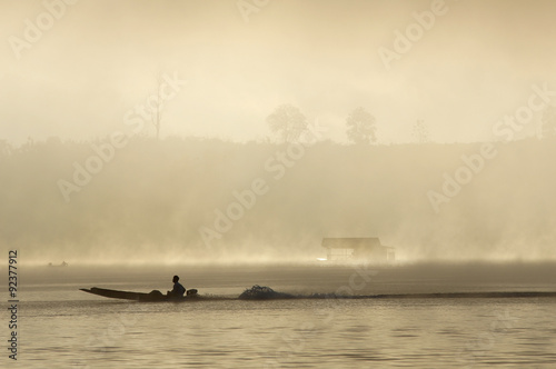 The boat in mist.