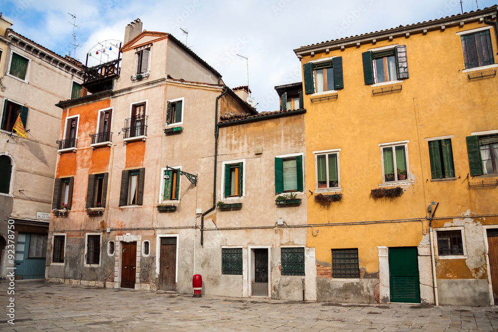 residential houses, facades, windows and shutters in Venice, Italy, Europe