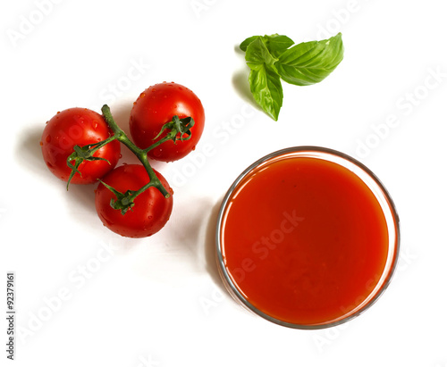 Glass of tomato juice directly above