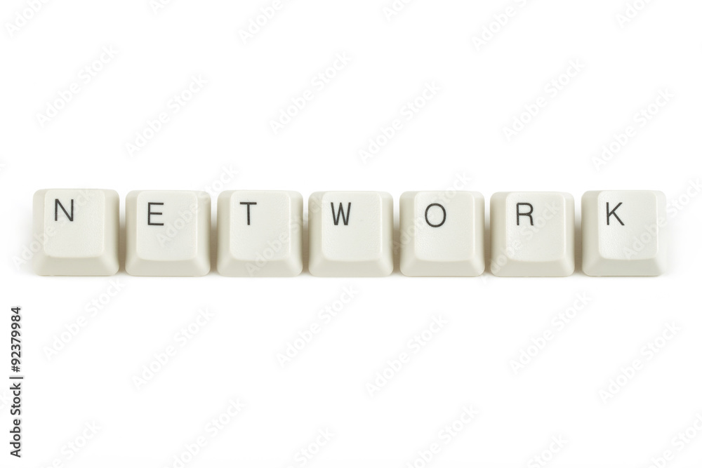 network from scattered keyboard keys on white