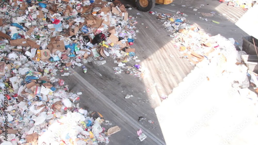 A Front End Loader Moves Trash at a Recycle Center