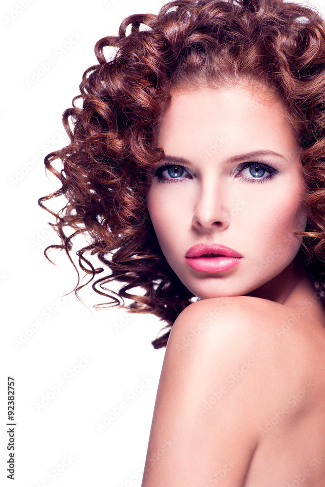 Fototapeta premium Beautiful sexy woman with brunette curly hair.
