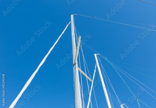 Close up of yacht mast on sky background