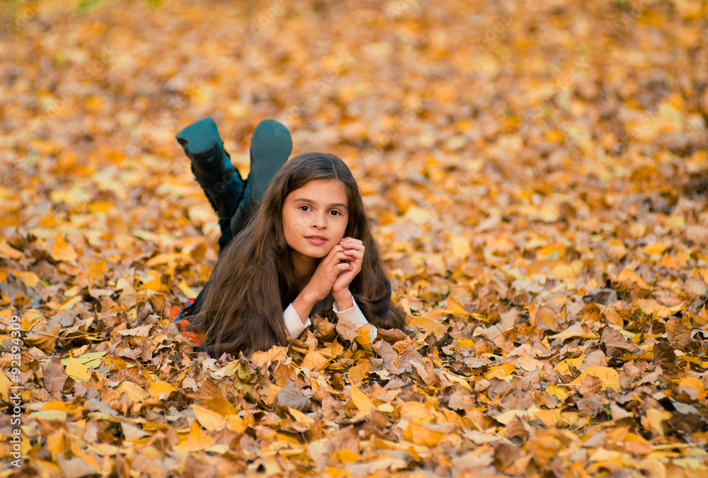 portrait of a beautiful smiling teenage in autumn