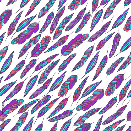 Seamless vector pattern with feathers. Boho style.