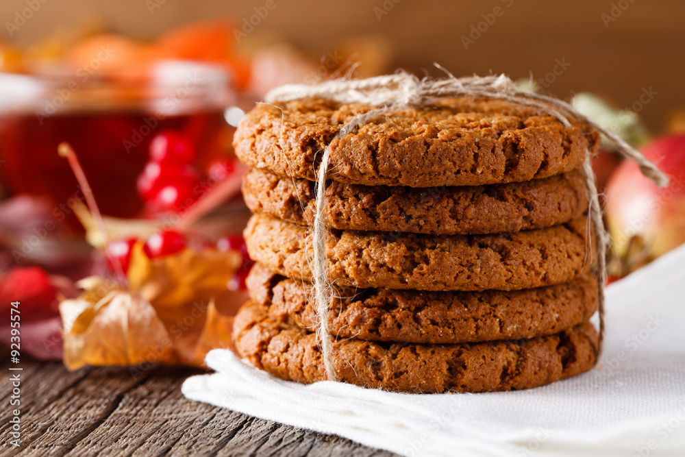 Fototapeta premium Fall harvesting on rustic wooden table with oat cookies