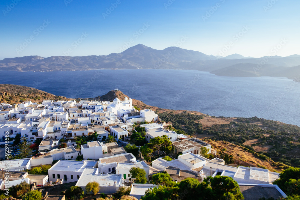 Scenic view of ocean and traditional Greek village Plaka, Greece