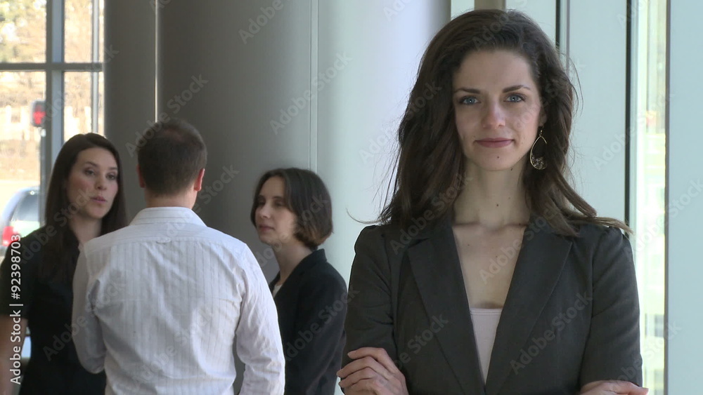 Office Female is happy what she is hearing her team members saying Office Female is happy what she is hearing her team members saying