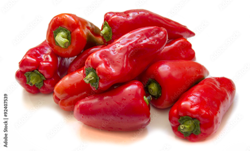 Red sweet peppers on a white background Red sweet peppers on a white background
