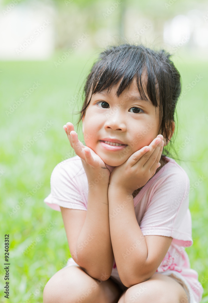 Cute little asian girl smile on nature background Cute little asian girl smile on nature background