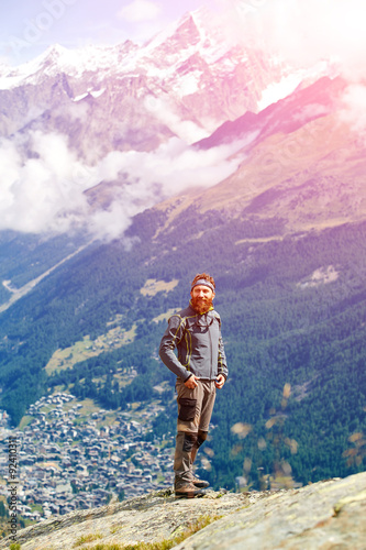 hiker at the top of a pass