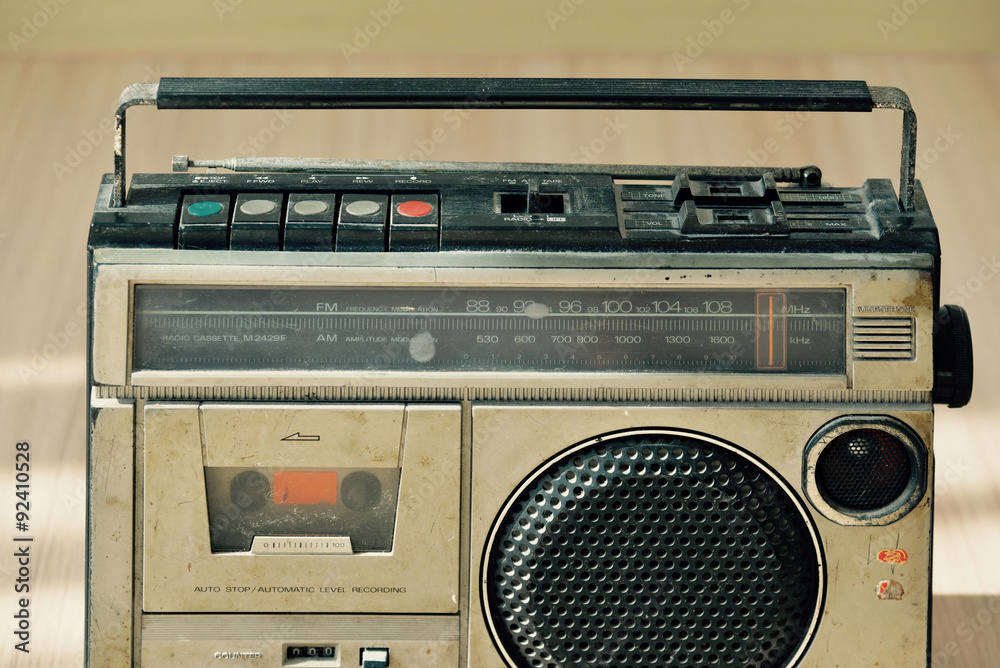 Obraz premium Dusty old radio with one cassette player