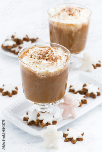 festive pumpkin latte and almond biscuits, vertical