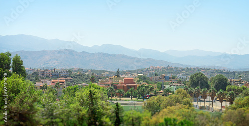 Aerial view of the town and mountains.