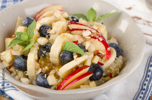 Healthy breakfast quinoa with fresh berries, fruits