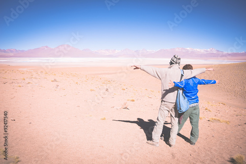 Couple traveling on the Bolivian Andes, toned image