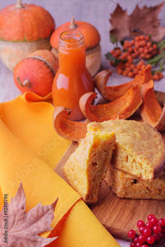Autumn still life. Homemade Pumpkin Pie and juice for Thanksgivi photo