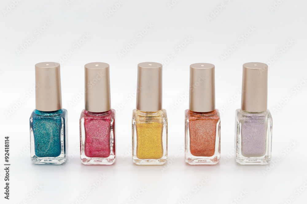 Five different glasses with nail colors in front of white background Five different glasses with nail colors in front of white background