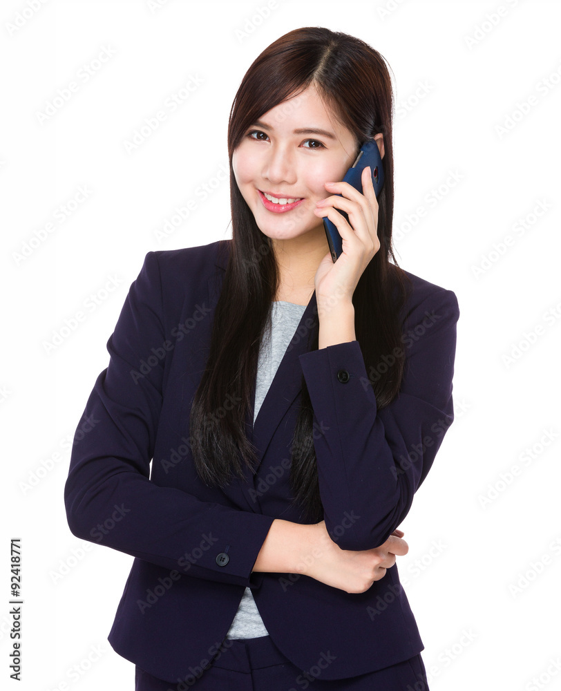 Asian businesswoman chat on mobile phone Asian businesswoman chat on mobile phone