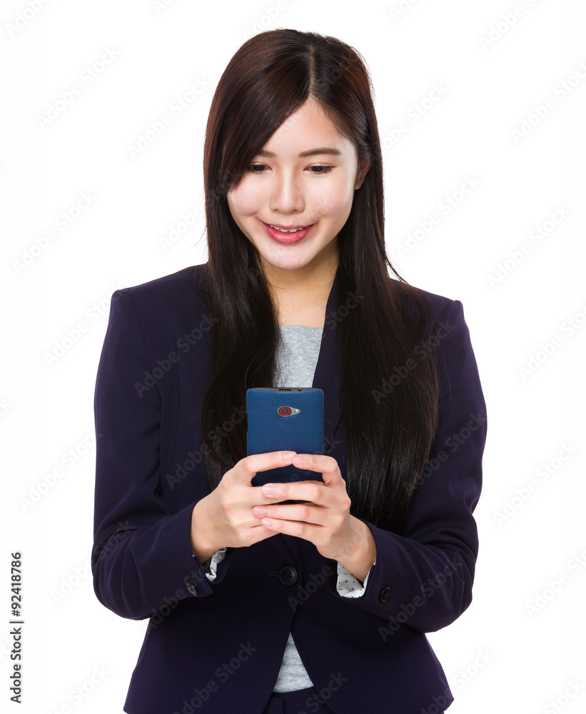 Asian young businesswoman read the message on cellphone Asian young businesswoman read the message on cellphone