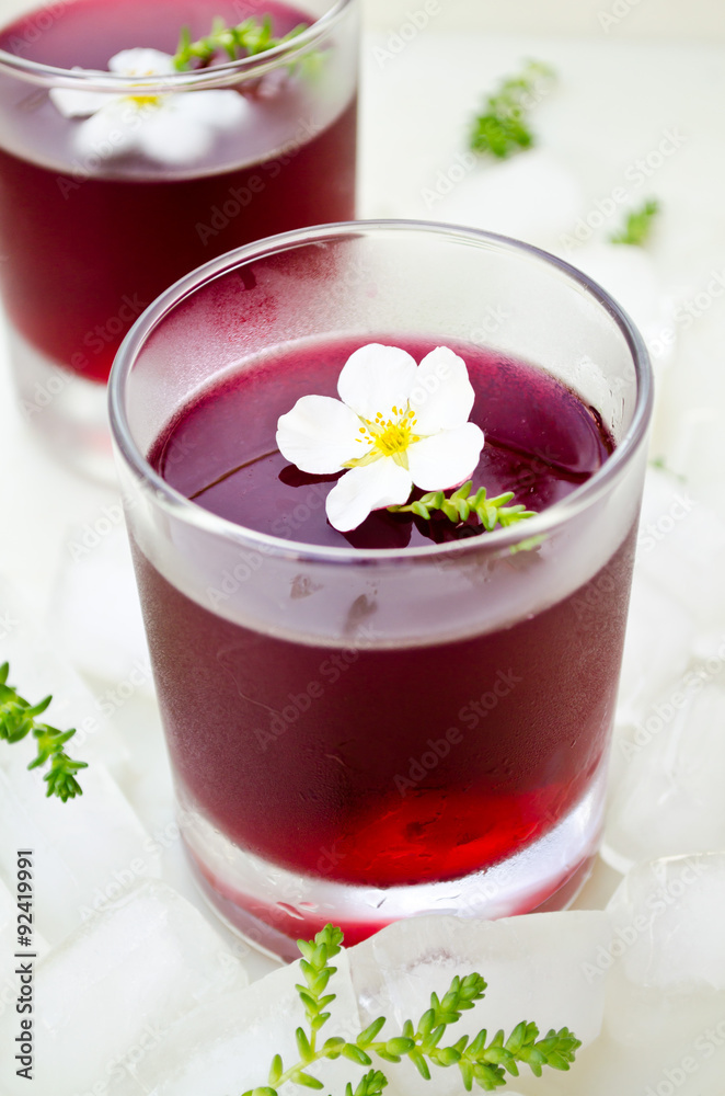 Red wine jelly with white flowers and ice Red wine jelly with white flowers and ice