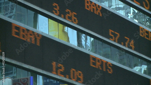 A stock ticker scrolls near times square