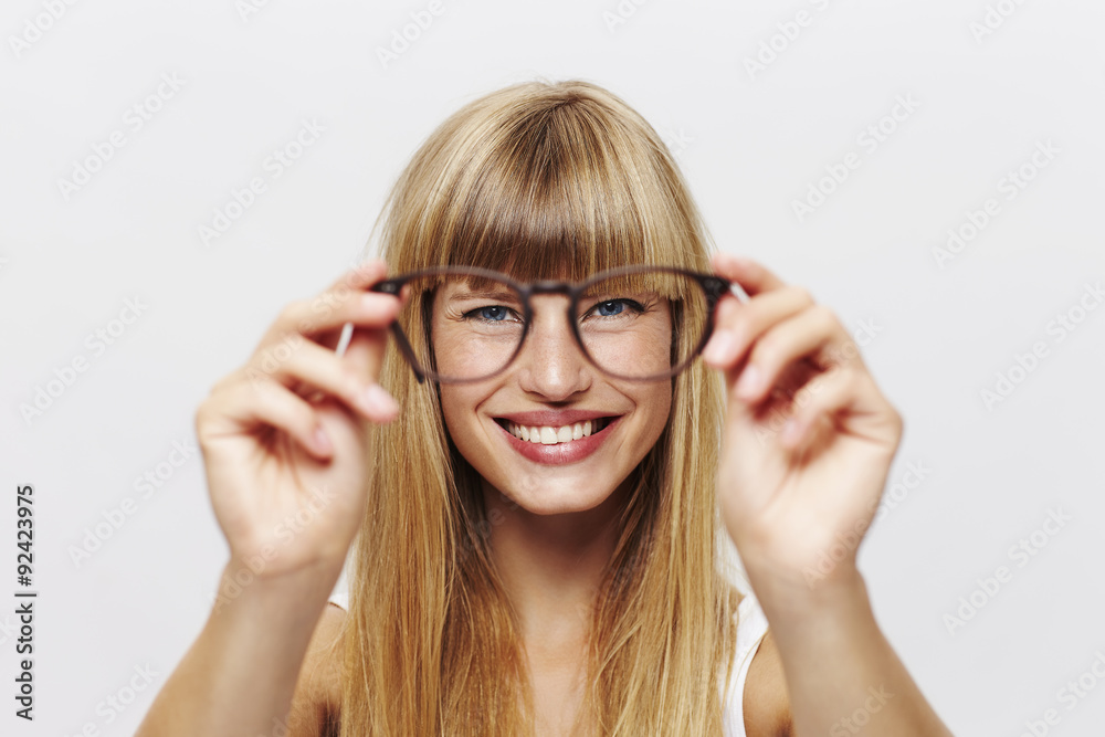 Smiling student with spectacles, portrait