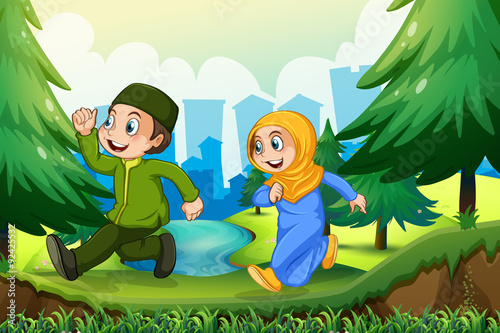 Muslim boy and girl in the park