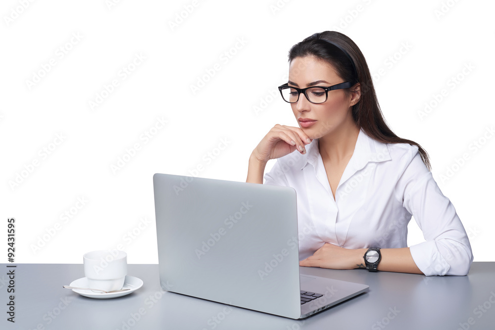 Business woman working online on a laptop Business woman working online on a laptop