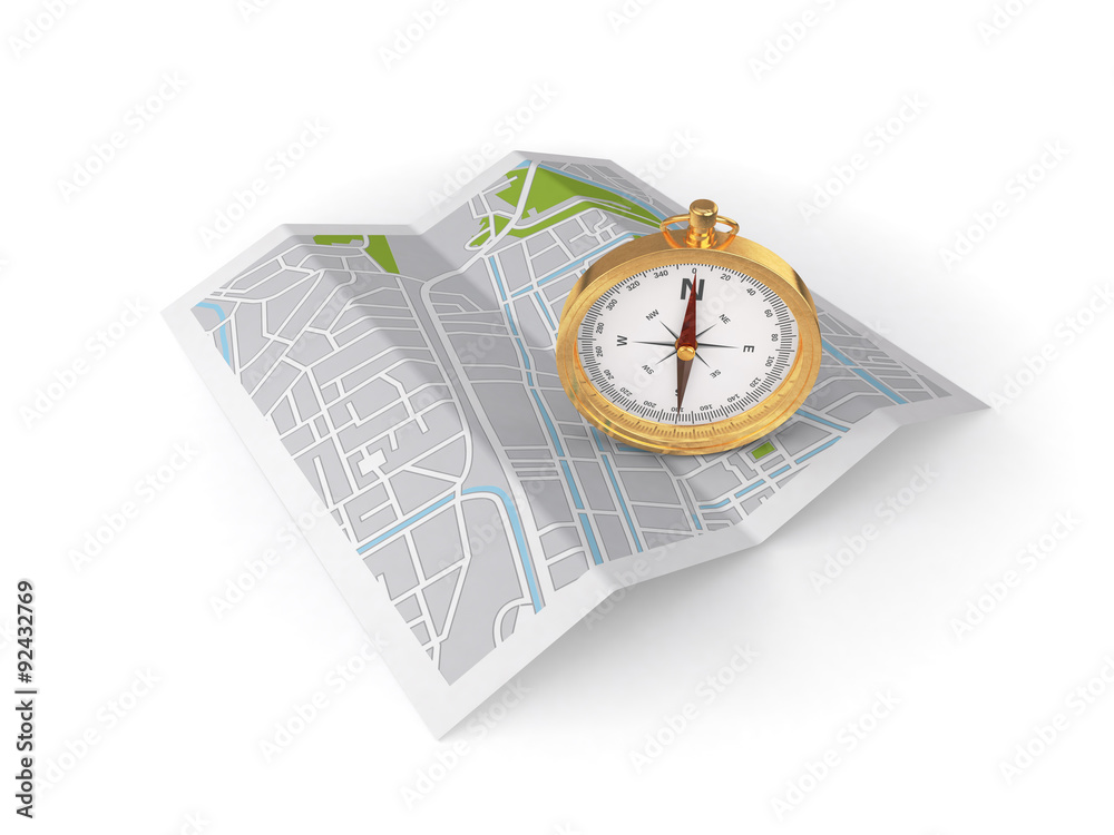 Gold compass on travel map