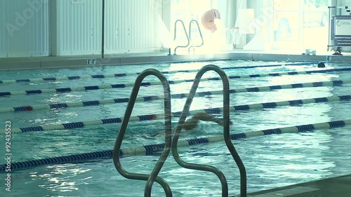Swimming laps in pool at YMCA photo