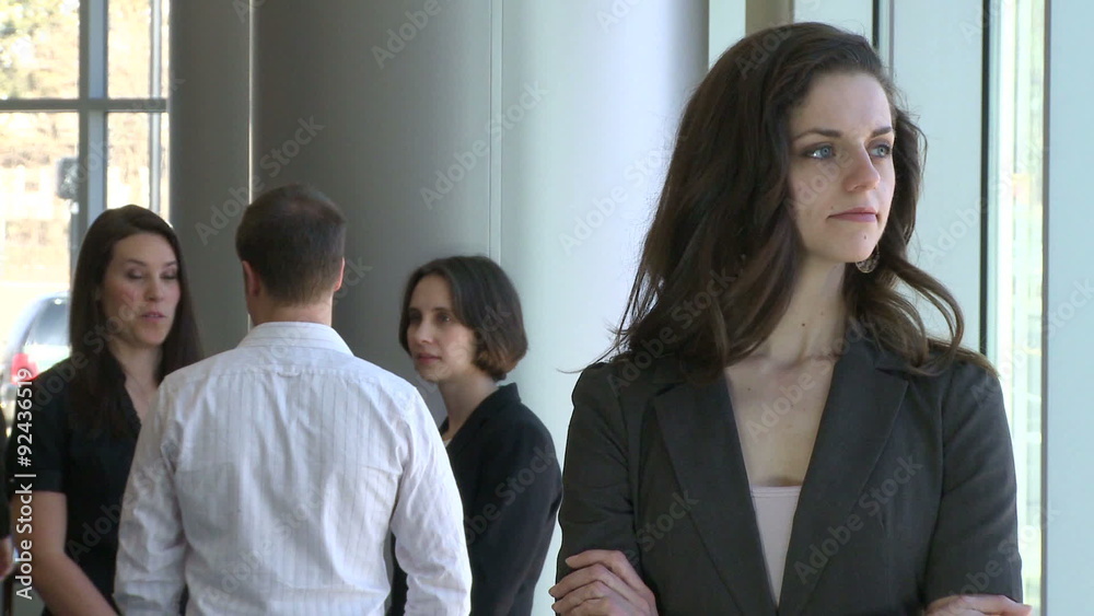 Office Female is not happy about the conversation behind her Office Female is not happy about the conversation behind her