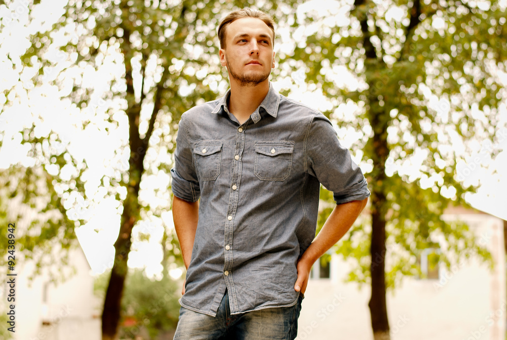 Portrait of a pensive young man with a beard Portrait of a pensive young man with a beard