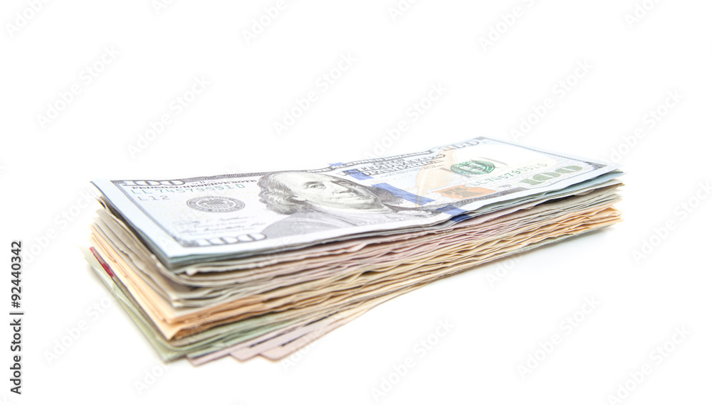Pile of dollar notes. All on white background. Pile of dollar notes. All on white background.