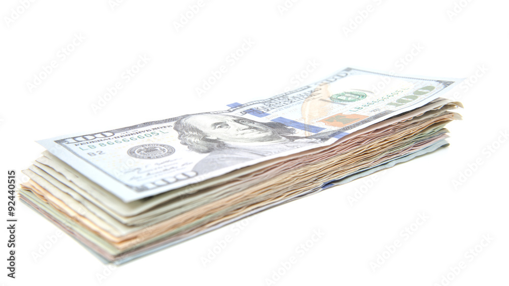 Pile of US dollar notes on white background Pile of US dollar notes on white background