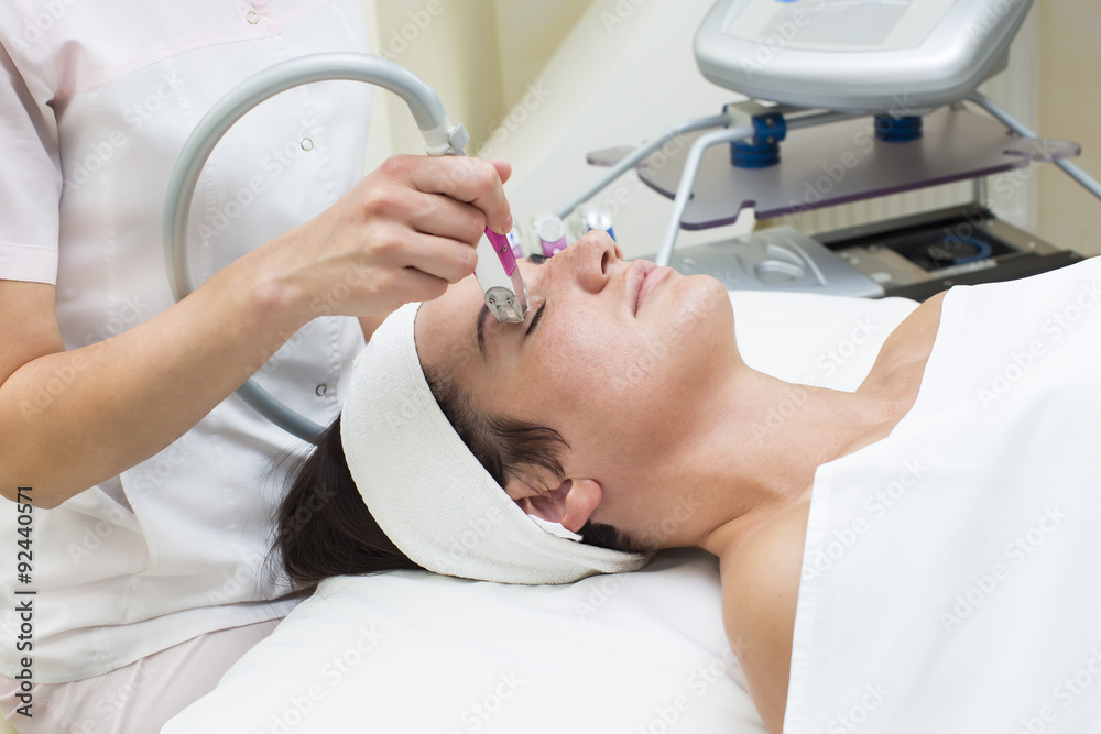 lymphatic drainage massage apparatus process is a girl in a beauty salon lymphatic drainage massage apparatus process is a girl in a beauty salon