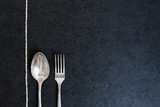 Silver spoon and fork with pearls