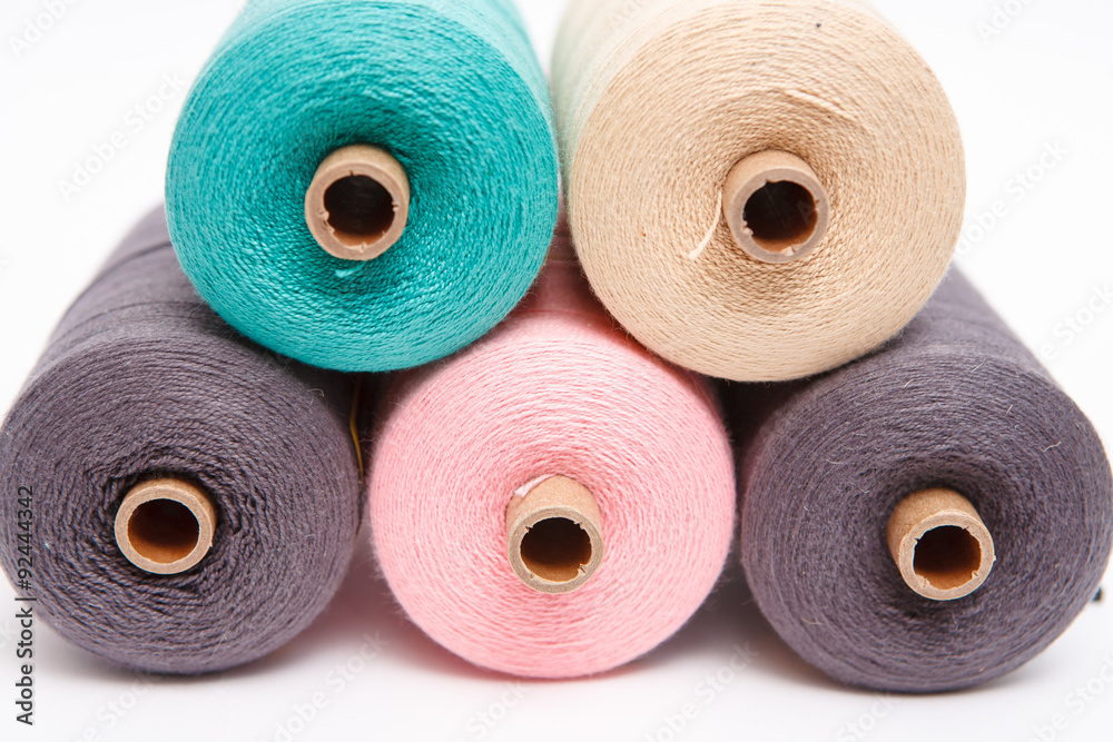 Sewing threads as a color background close up Sewing threads as a color background close up