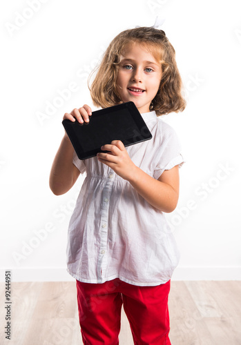 Girl holding a tablet